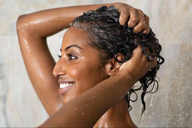 You should not co-wash your hair, especially the part of hair with bonds