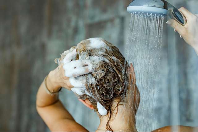 Relax your shower schedule to tackly dry scalp problem