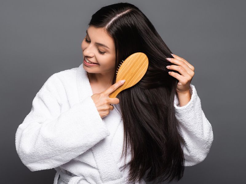Using specialized comb- Back combing brush