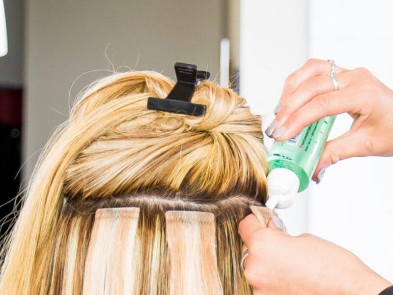 Use a professional adhesive remover when taking out tape-ins