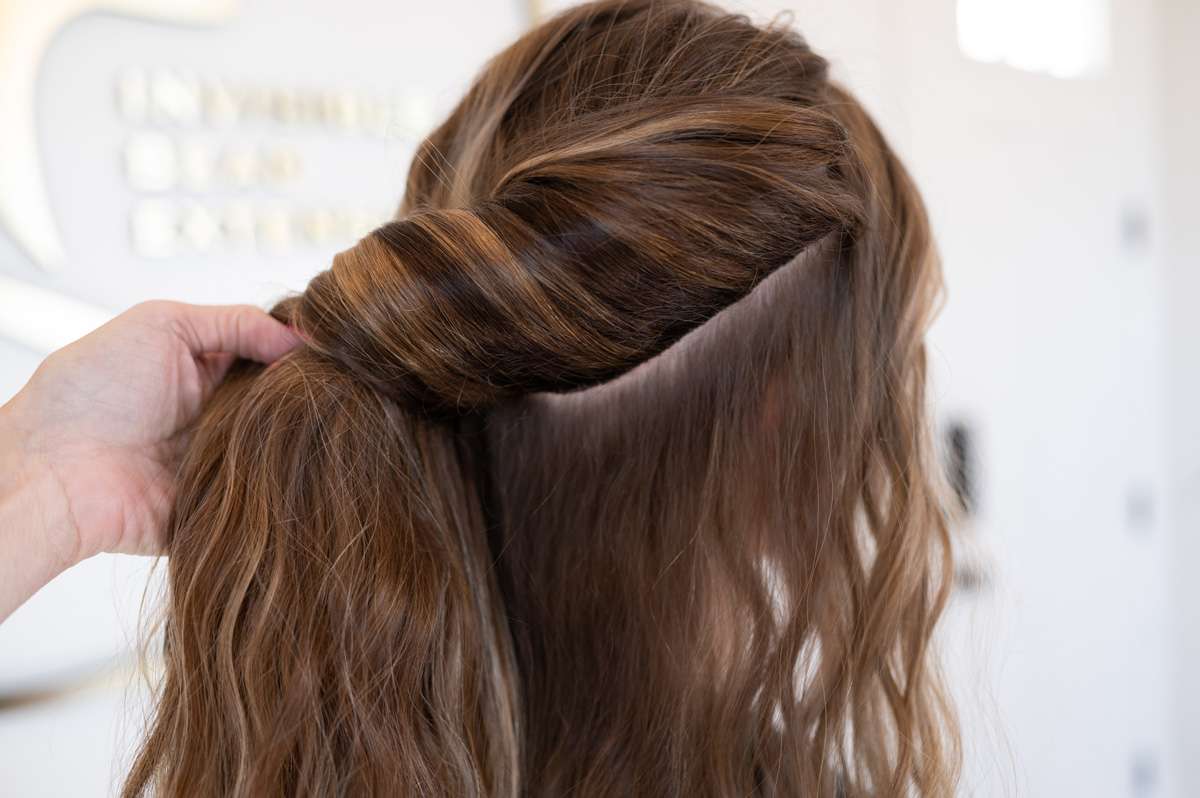 How do you hide invisible tape extensions?