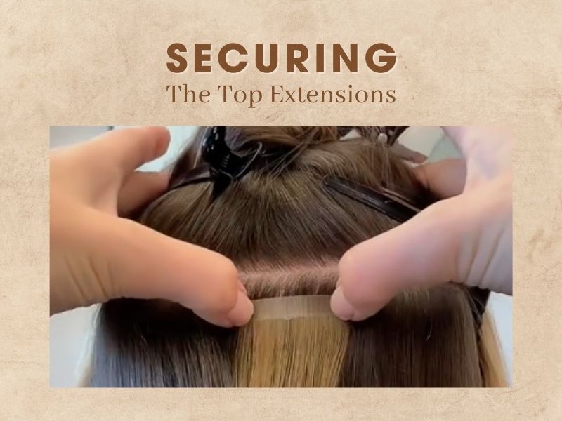 how to put in tape in hair extensions – Securing the top extensions after attaching the bottom