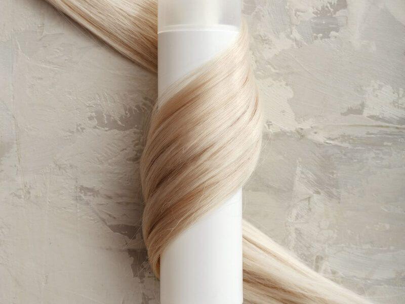 Use light spray to keep your hair in style