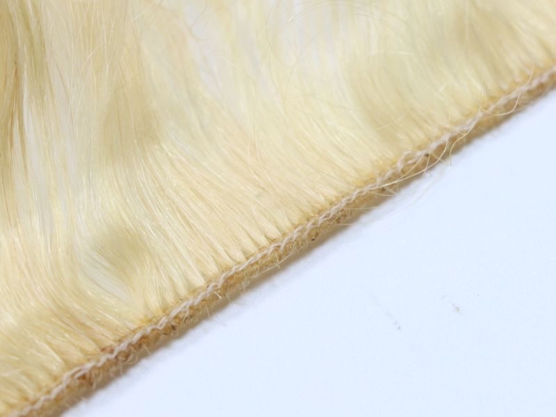 The line of hand tied weft is thin and realistic 