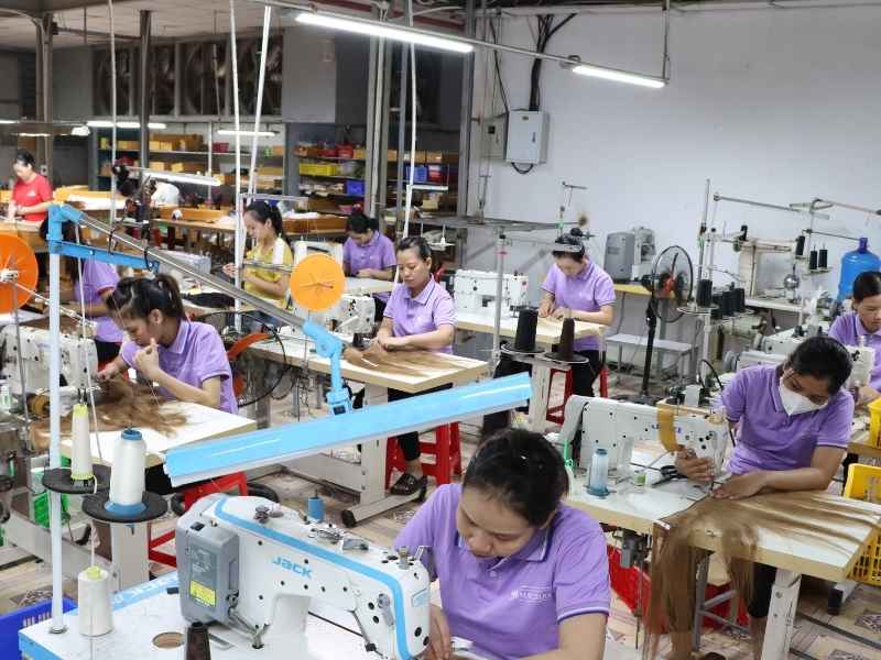 Workers are working at the Mascara Hair factory