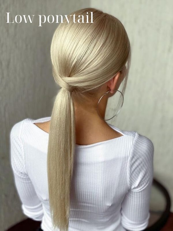 Try a low ponytail for a more soft and gentle look