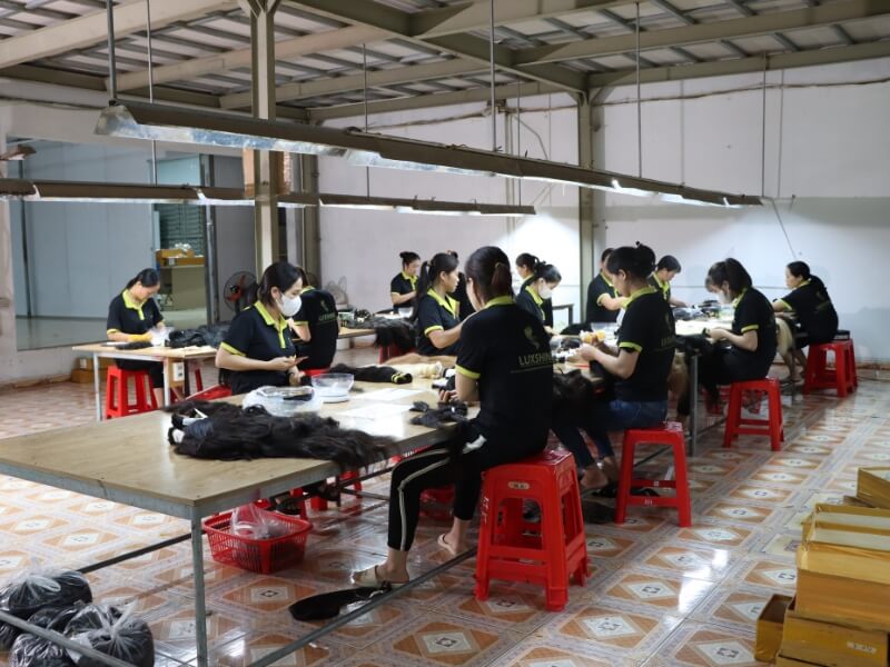 Workers are working hard at Luxshine hair factory