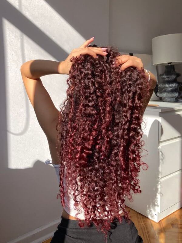 Enhance your natural curls by giving them depth, shine, and vibrant