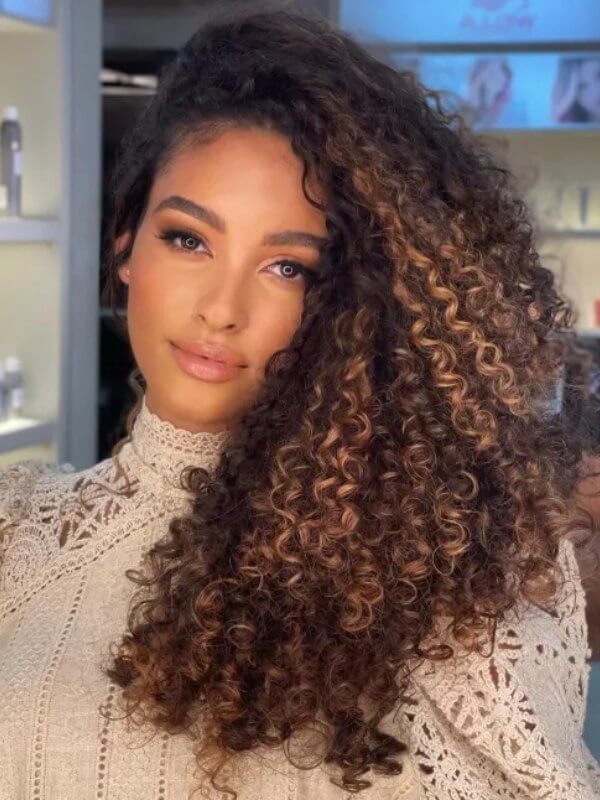 Loose, bouncy curls transition for a beautiful gradient effect.