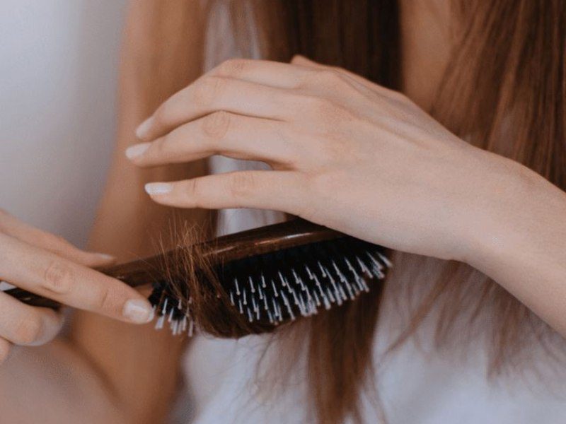 Use a gentle hairbrush to remove any tangles before styling your hair for bed