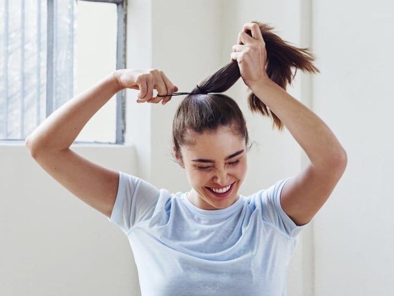 Tight ponytails or buns can cause damage and even natural hair loss