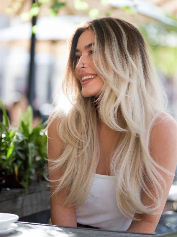 Sun-kissed golden tones brighten up your hair with a smooth, natural transition