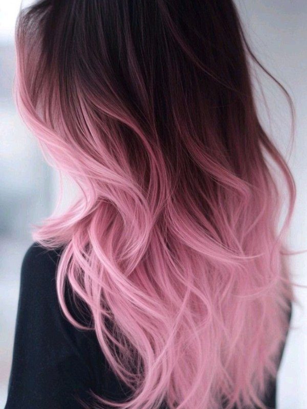 A fun and flirty fade from natural roots to pastel or vibrant pink