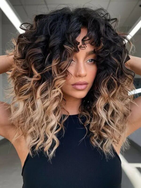 Curls enhance the color transition, making ombre shades pop