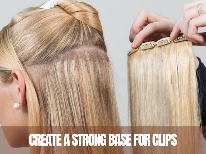Tease the roots slightly to give your clips a secure grip