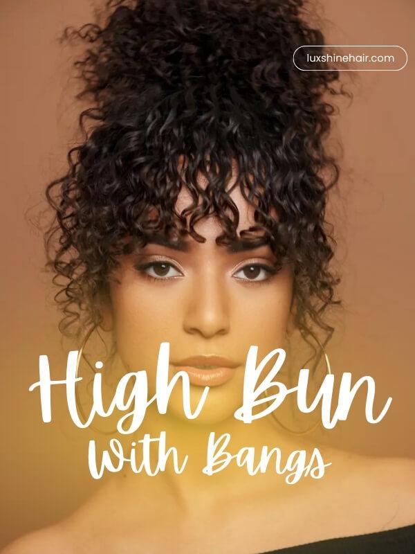 A playful mix of a sleek high puff and curly bangs to perfectly frame your face