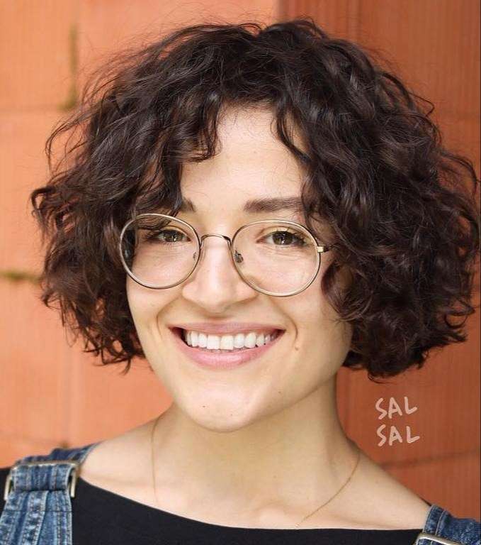 Jaw length curly bob with bangs