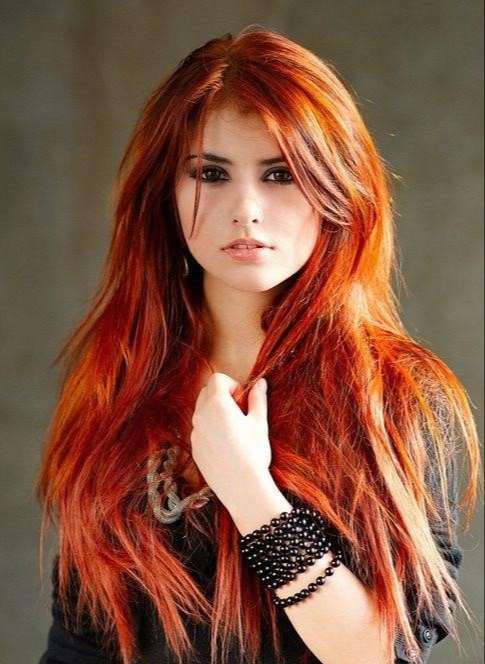 Light red hair with orange highlights