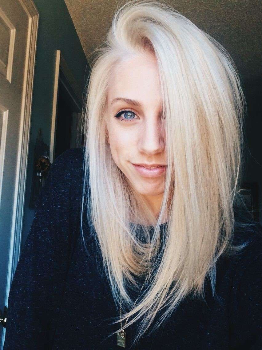 Side parted straight blonde platinum hair