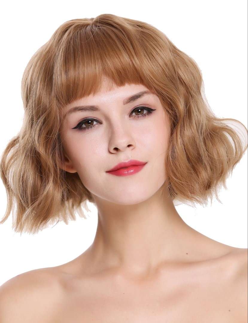 Wild wavy bob with short font bangs in ash blonde copper