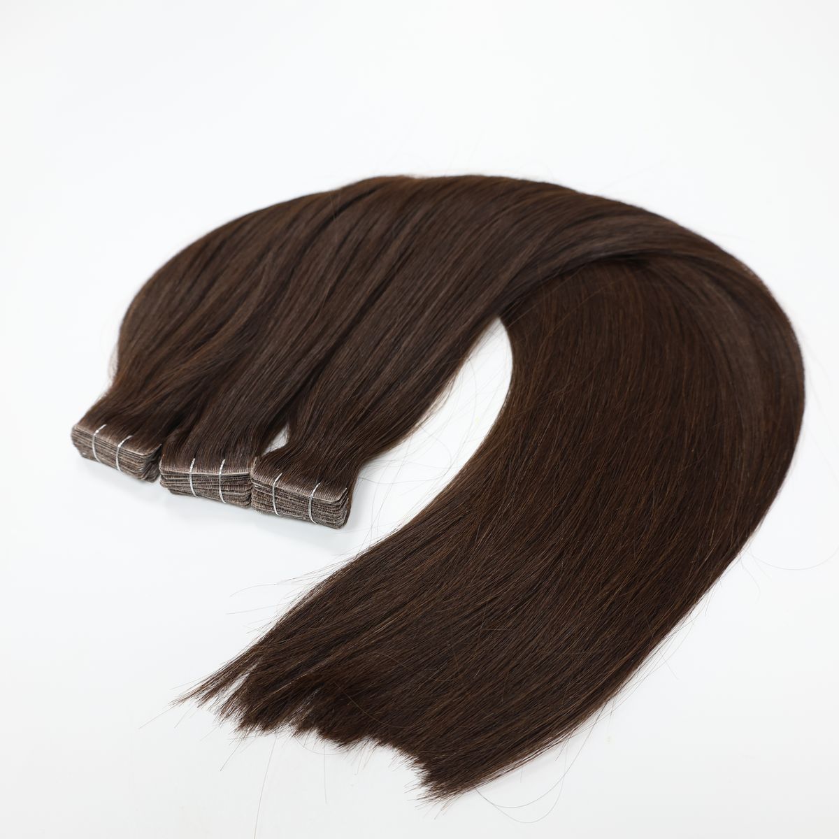 Invisible tape-in extensions in dark brown