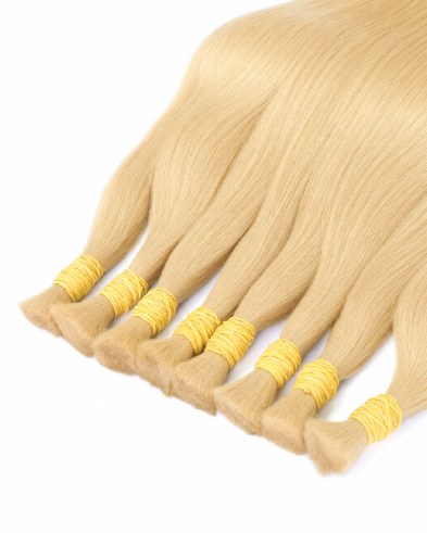 Medium Standard bulk hair in light blonde, each bundle tied with yellow thread